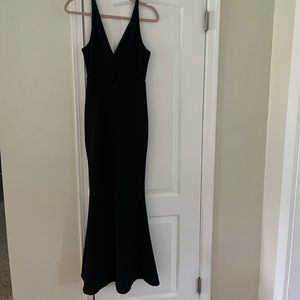 Long dress. Hug’s body like a glove. Gives that million dollar look.